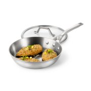stainless steel pan with breaded chicken image number 2