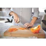 https://newellbrands.scene7.com/is/image/NewellRubbermaid/1932932-calphalon-classic-cutlery-self-sharpen-8-inch-chefs-knife-bell-pepper-in-use-6?wid=180&hei=180