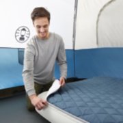 queen air mattress with mattress topper being unzipped image number 6