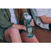 girl with blue water bottle image number 7
