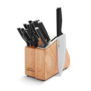 knife block with chefs knife next to it image number 1