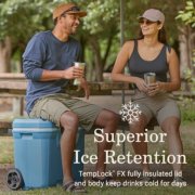 Two people with cooler that has superior ice retention image number 1