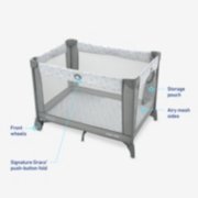 bassinet with front wheels storage pouch push-button fold and airy mesh sides image number 6