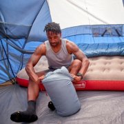 Camper unpacks Coleman sleeping bag in tent image number 6