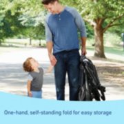 Male-presenting person holding toddler’s left hand with his right hand, and the folded jogger with his left hand image number 4