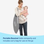 portable bassinet folds compactly and includes carry bag for use on the go image number 4