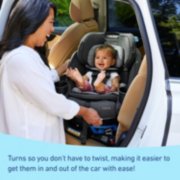 woman with baby in car seat that turns so you don't have to twist image number 3