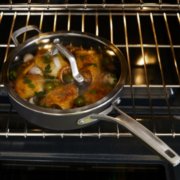 a skillet pan cooking meal in oven image number 9