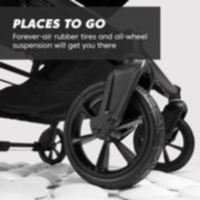 Close up of the wheels of a folding stroller image number 3