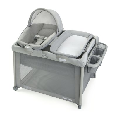 Playard with portable seat, bassinet, and diaper changer