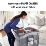 baby in diaper changer of pack n play playard image number 2