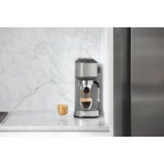 Espresso machine on countertop with mugs image number 4