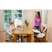 two children at table in blossom highchairs and booster seats image number 8