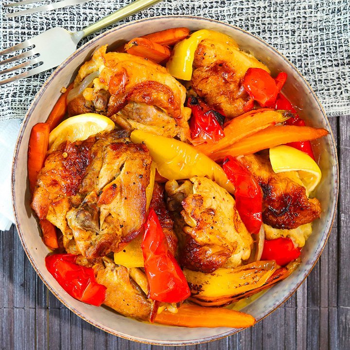 prepared meal in bowl with meat and peppers