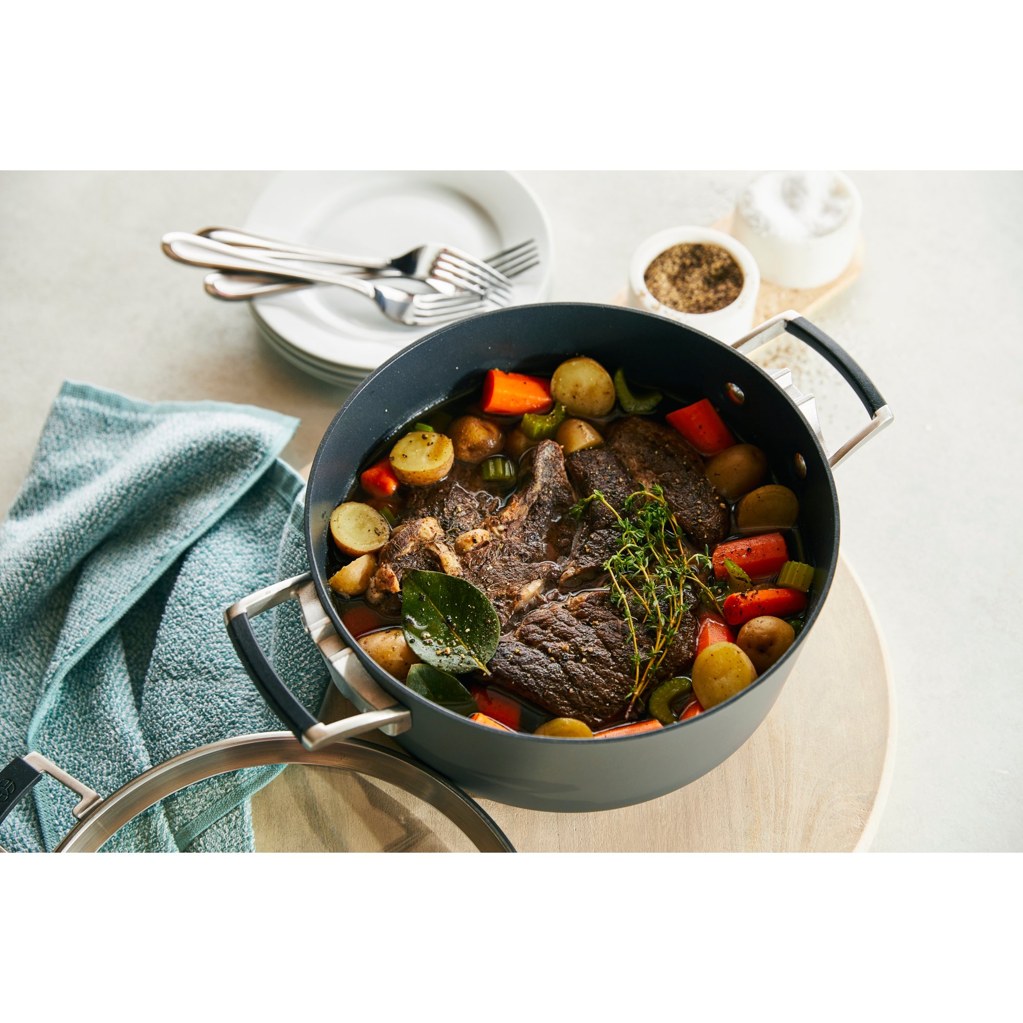https://newellbrands.scene7.com/is/image/NewellRubbermaid/Calphalon-Cookware-Good-Tier-Tempered-Glass-Lids-Select-Space-Saving-straight-on-slightly-high-with-talnt-with-food-3?wid=2000&hei=2000
