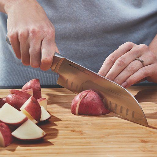Person using a chef knife