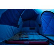 inside of camping tent with sleeping bags and air mattress image number 4