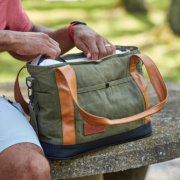soft cooler outside on picnic table with pockets and faux leather handles image number 7