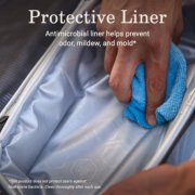 Person wiping antimicrobial liner in Sling cooler image number 7