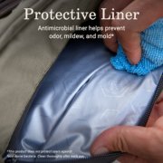 Person wiping protective antimicrobial liner in tote pack image number 7