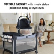 portable bassinet playard and diaper changing table in living room image number 3