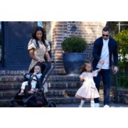family with little girl and baby in stroller image number 6