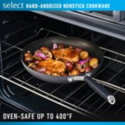 Food cooking in select hard anodized nonstick pan that is oven safe up to four hundred degrees image number 4