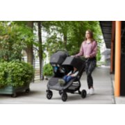 Mother pushing city mini GT2 double stroller with child image number 11